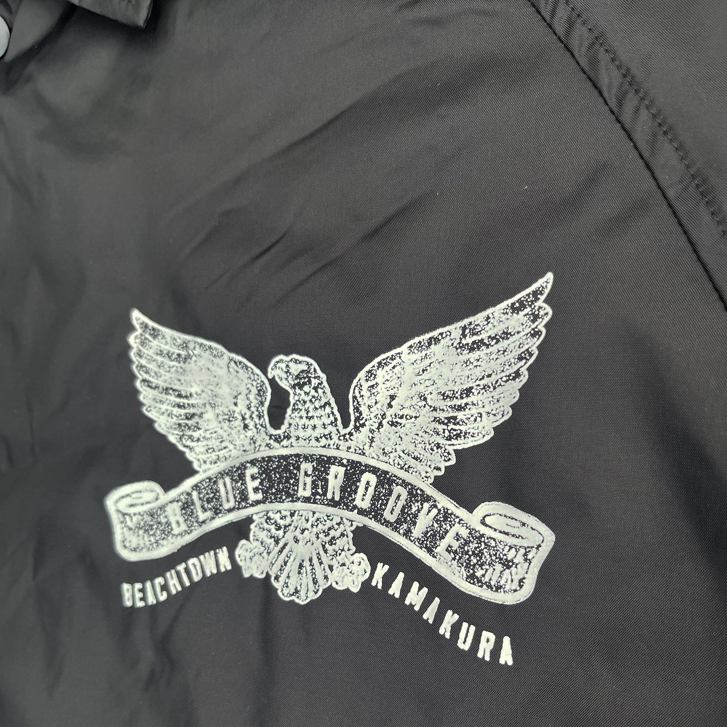 “FLYING EAGLES” WATERPROOF COACH JKT - BLACK